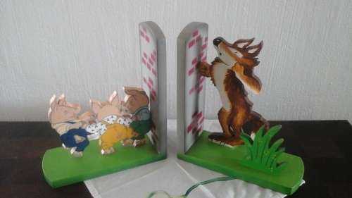 TWO SIMPLY TERRIFIC THREE LITTLE PIGS BOOK ENDS. AWESOME DECORATIVE AND USEFUL PIECE!