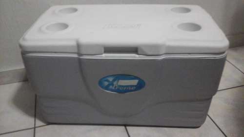 EVEN IN WINTER THIS MAGNIFICENT AND HANDY COLMAN COOLER BOX WHICH HAS HOLDERS FOR  BEERS IS HANDY