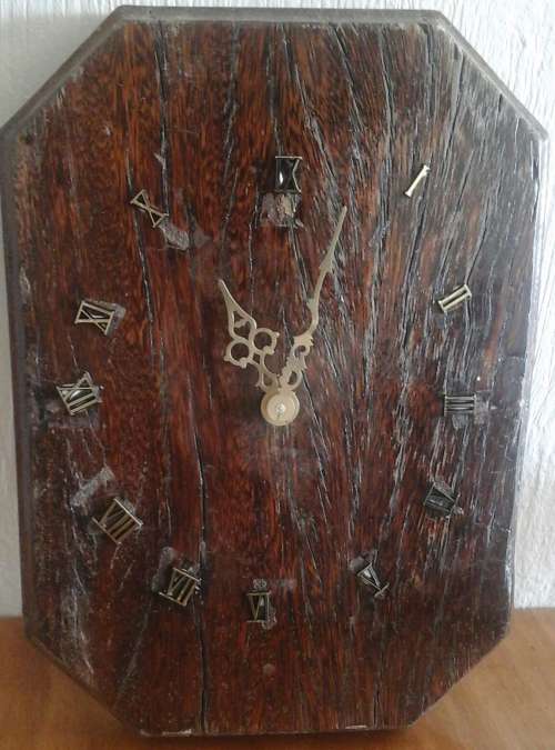 MAGNIFICENT SLEEPER WOOD WALL CLOCK. TERRIFIC PIECE! SOLID AND BEAUTIFUL