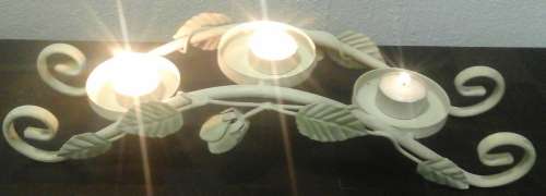 AN AMAZINGLY DESIGNED BRIDGE SHAPED THREE CANDLE CANDLE HOLDER. MAGNIFICENT PIECE