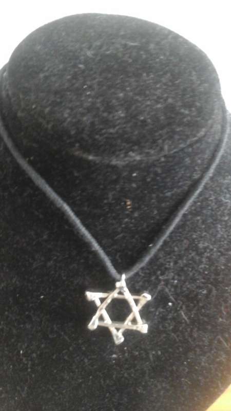 4 GORGEOUS STAR SHAPED NECKLACES. MADE FROM VINTAGE HORSESHOE NAILS. BEAUTIFUL & UNUSUAL PIECE!