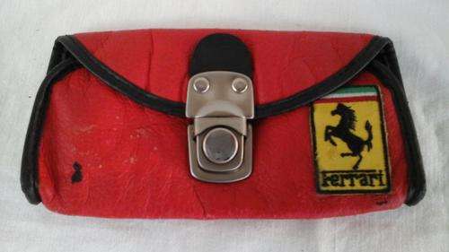 UNIQUE COLLECTIBLE FERRARI POUCH.  SLIP YOUR BELT THROUGH THE LOOPS AND YOU WILL BE THE ENVY OF MANY