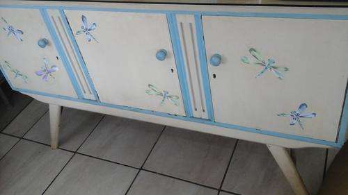 GORGEOUS VINTAGE PAINTED KIAAT THREE DOOR SIDE BOARD. HAS PICTURES OF DRAGONFLIES