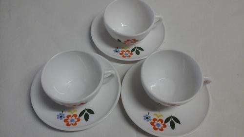 DELIGHTFUL LITTLE ESSPRESSO CUP AND SAUCERS. FLORAL PATTERN ON SAUCER AND CUP