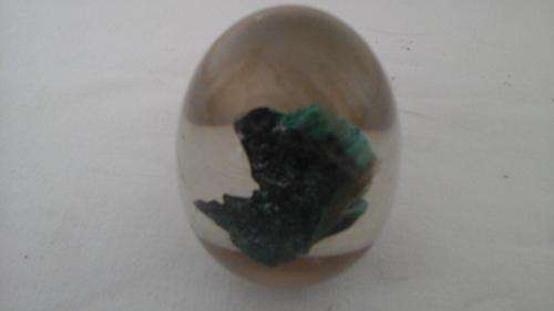 FANTASTIC GLASS EGG WITH A BLUE STONE INSIDE. TOTALLY UNUSUAL