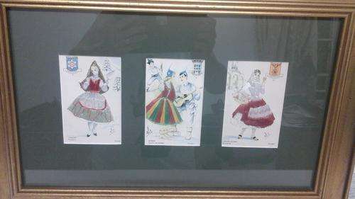 MAGNIFICENT ORNATE FRAMED PICTURE OF TRADITIONAL DRESS OF DIFFERENT PARTS OF PORTUGAL.