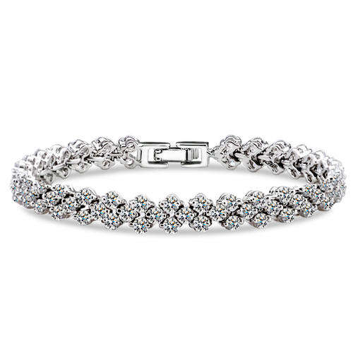 EXQUISITE TENNIS BRACELET----   LENGTH: 18CM - WIDTH OF EACH CRYSTAL: 0,3CM - WIDTH OF BRACELET:0,6C