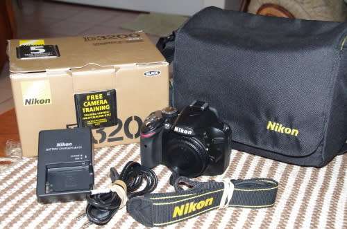 Nikon D3200 body in top like new condition, shutter count of 1000, photos show exact item