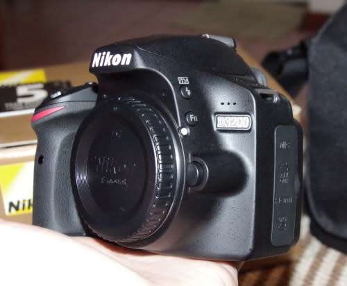 Nikon D3200 body in top like new condition, shutter count of 1000, photos show exact item