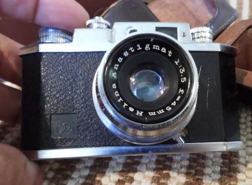 Old Bolex 8mm movie and a small film camera, photos show exact items, sold as pair