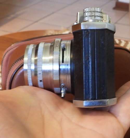 Old Bolex 8mm movie and a small film camera, photos show exact items, sold as pair