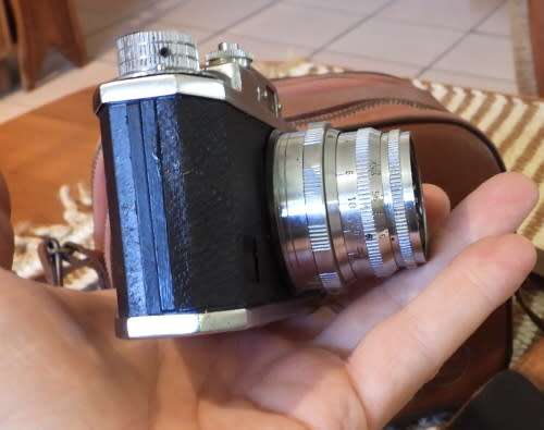 Old Bolex 8mm movie and a small film camera, photos show exact items, sold as pair