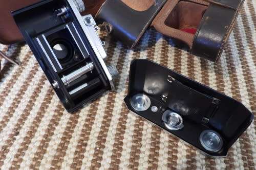 Old Bolex 8mm movie and a small film camera, photos show exact items, sold as pair