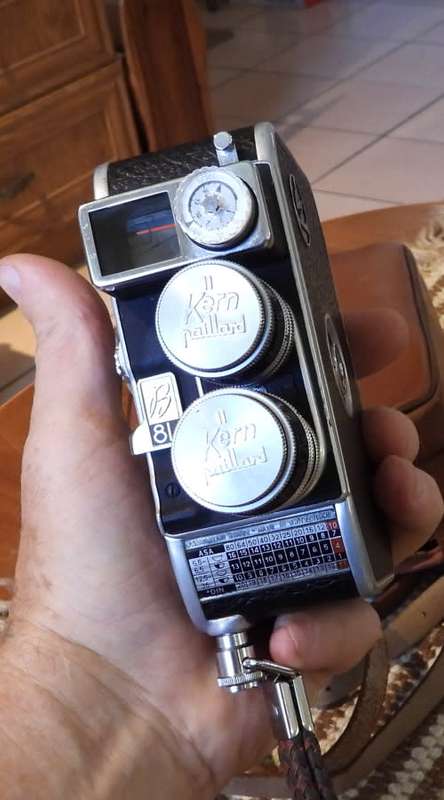 Old Bolex 8mm movie and a small film camera, photos show exact items, sold as pair
