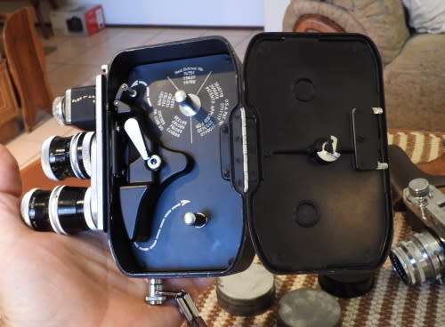 Old Bolex 8mm movie and a small film camera, photos show exact items, sold as pair