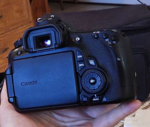Canon 60D body only with accesories shown in Photo, has some minor signs of ues, good condition,