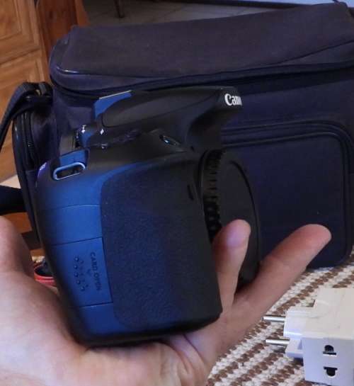 Canon 60D body only with accesories shown in Photo, has some minor signs of ues, good condition,