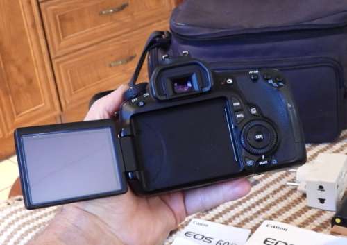 Canon 60D body only with accesories shown in Photo, has some minor signs of ues, good condition,