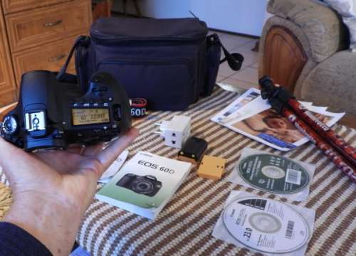 Canon 60D body only with accesories shown in Photo, has some minor signs of ues, good condition,