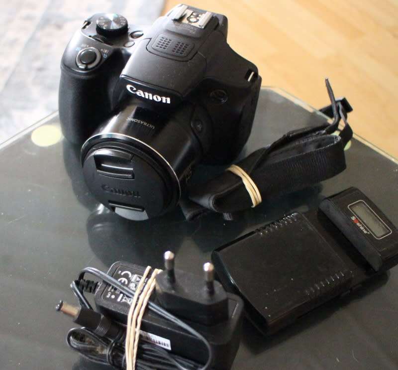 Canon SX 60 HS, photos show exact item on sale, good working condition.