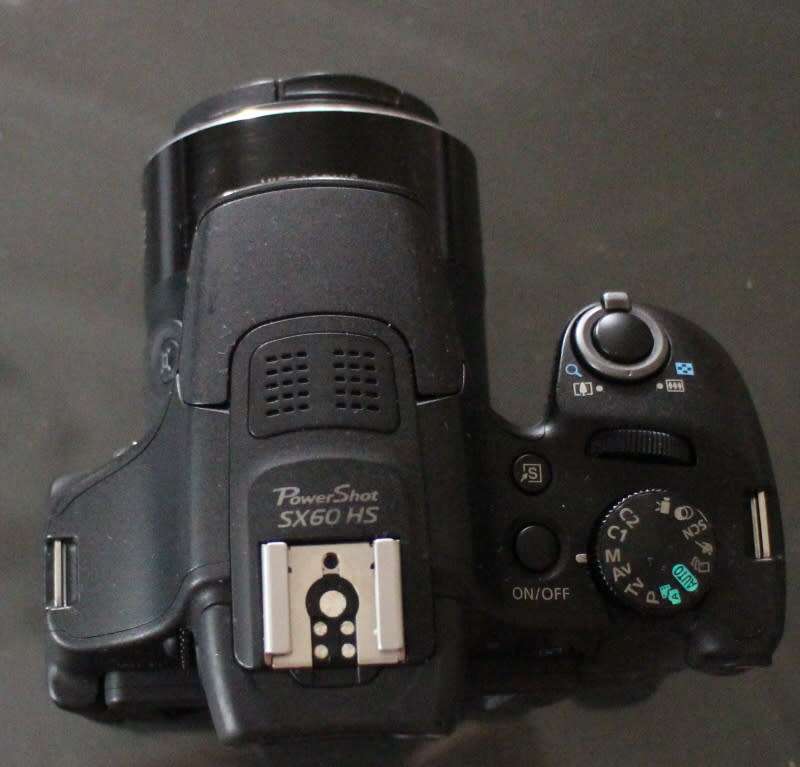 Canon SX 60 HS, photos show exact item on sale, good working condition.