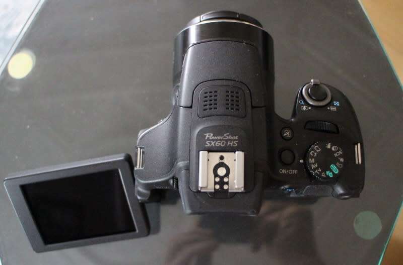 Canon SX 60 HS, photos show exact item on sale, good working condition.