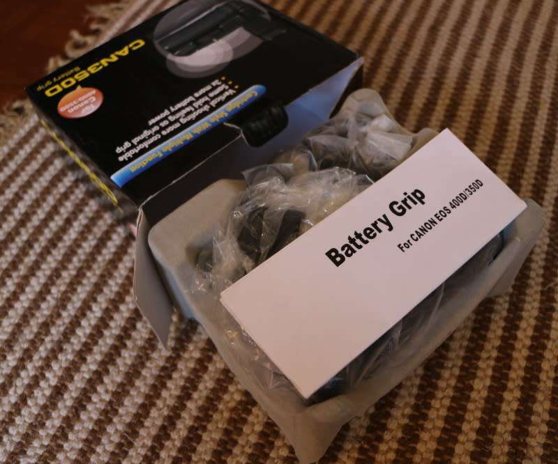 Battery pack for Canon 350D 400D, photos show item on sale, has built in battery pack, has charger.