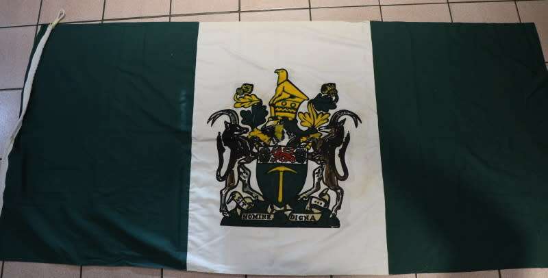 Rhodesian Flag and 2 smaller unknown flags,