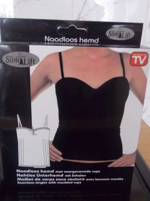TV ADDS!!! SEAMLESS SINGLET WITH MOULDED CUPS (LOOKS 10LBS THINNER)