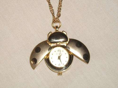 SILVER BUTERFLY PENDANT WITH A STUNNING HIGH CLASS JUSTIN WATCH AND A MATCHING CHAIN ALL IN ONE