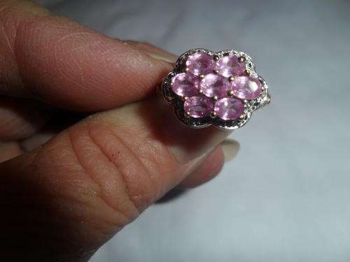 CLUSTER OF PINK QUARTZ AND DIAMONDS SET IN GOLD
