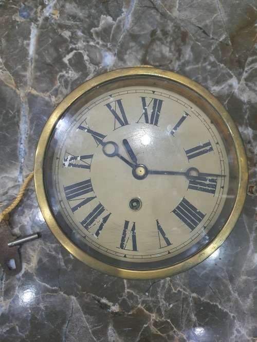 VINTAGE SHIPS CLOCK....SOLID BRASS...WORKING ORDER
