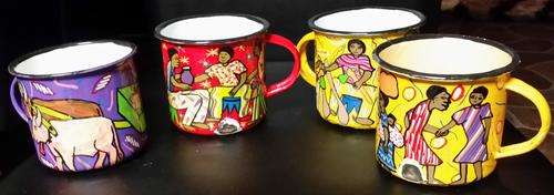 FOUR VINTAGE ENAMEL CUPS WITH BEAUTIFUL HAND PAINTED AFRICAN TRIBAL ART.