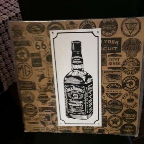 VINTAGE JACK DANIEL SIGN MOUNTED ON BOARD.