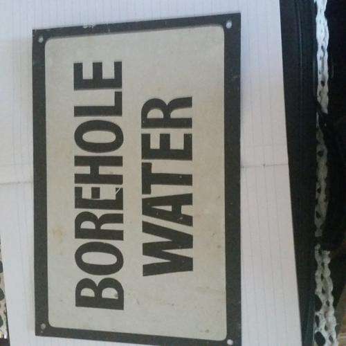 VINTAGE BOREHOLE WATER SIGN ON METAL PLATING