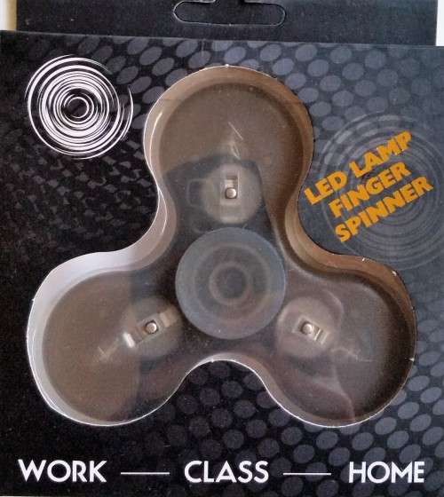 LED Fidget spinner. Lights up red, blue and green.