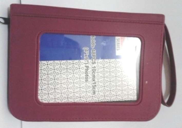 48 PC Photo Album - closes with zip and has a handle!!- Carry those memories with you!!