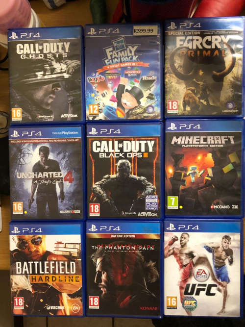 Sony Playstation 4 With 2 Remotes And 9 Games