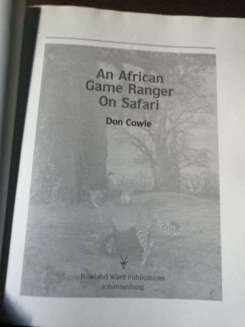 AN AFRICAN GAME RANGER ON SAFARI - Don Cowie