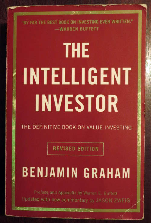 Benjamin Graham. The Intelligent Investor. Introduced by Warren Buffett. Revised edition