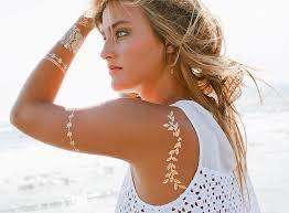 Shimmer Lasts for days Contains sheets of temporary metallic tattoos