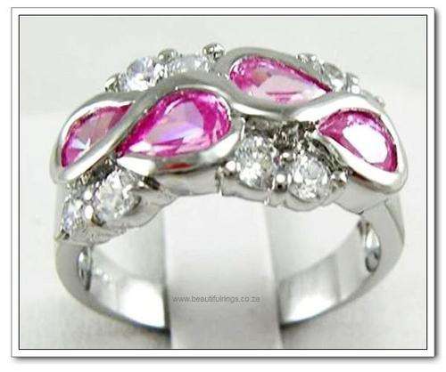 Beautiful 14kt white gold GP and 1.0ct pink lab sapphire ring.