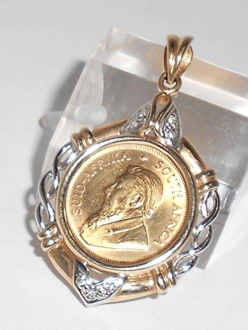 Two-tone gold Kruger coin pendant with 1 x one tenth Kruger coin and diamonds