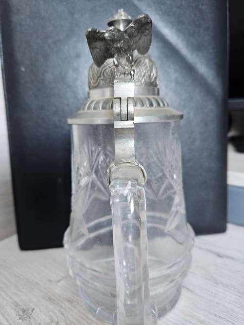 Glass beer mug with lid
