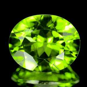 JUST JEWELS - QUALITY PERIDOT OVAL CUT (11.1 x  9.1mm - 3.89 Ct)