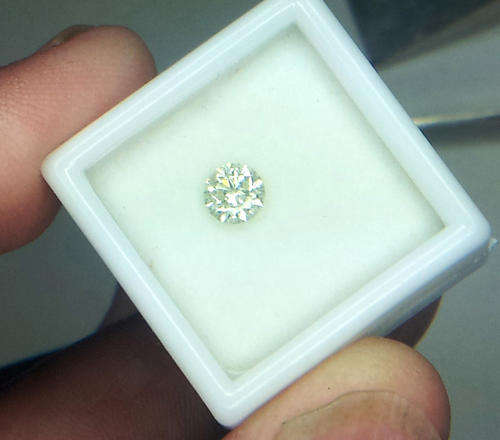 IGL CERTIFIED ($2861) LASER INSCRIBED  DIAMOND (0.71 Ct, J , SI1, VG. Ideal Cut)