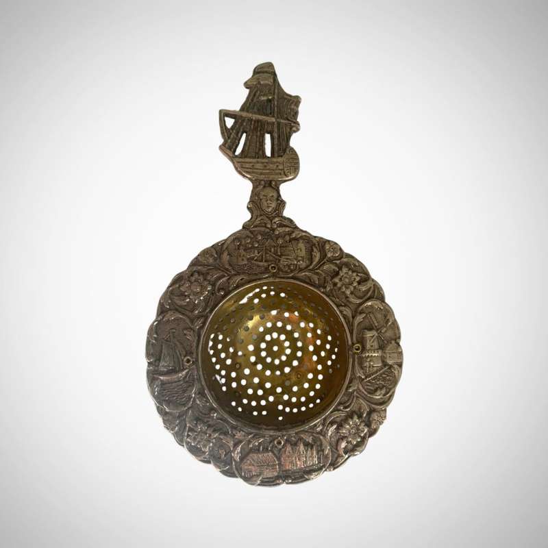 Vintage Dutch Silver Plated Tea Strainer with Ornate Canal Scene and Sailing Ship Handle c.1935