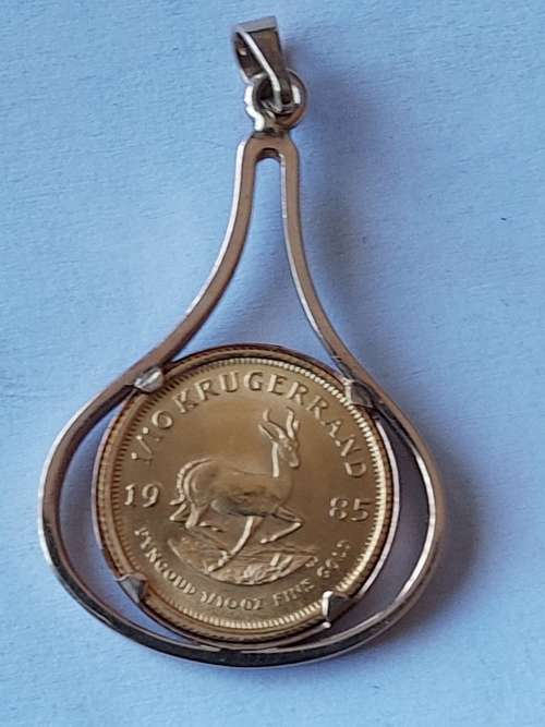 1/10 oz KRUGER RAND IN 9CT GOLD PENDANT