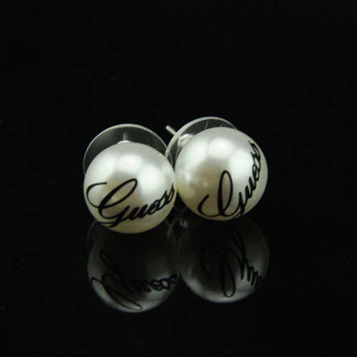 Brand new GUESS earrings.