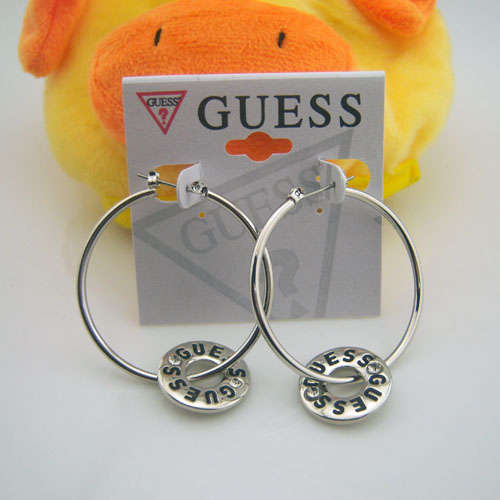 Brand new GUESS boutique round earrings.